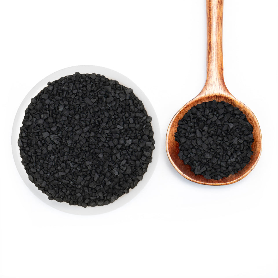 Black Lava Sea Salt in white bowl and spoon